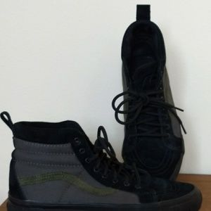 Black and green vans high tops